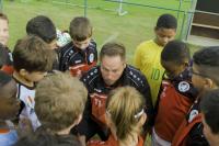 Trainer met kinderen