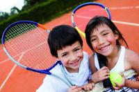 Kinderen met tennisracket